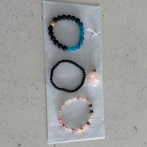 Set of earth stone bracelets in (black is lava stone)